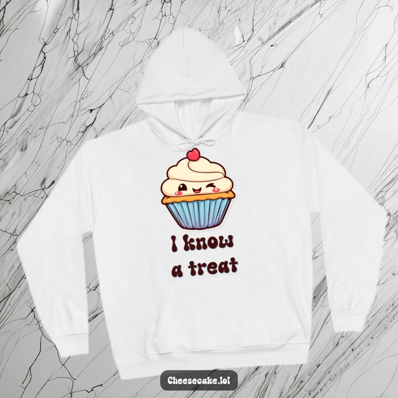 Funny Hoodie featuring a smiling cupcake character giving a mischievous wink, perfect for cozying up with a touch of sweetness.