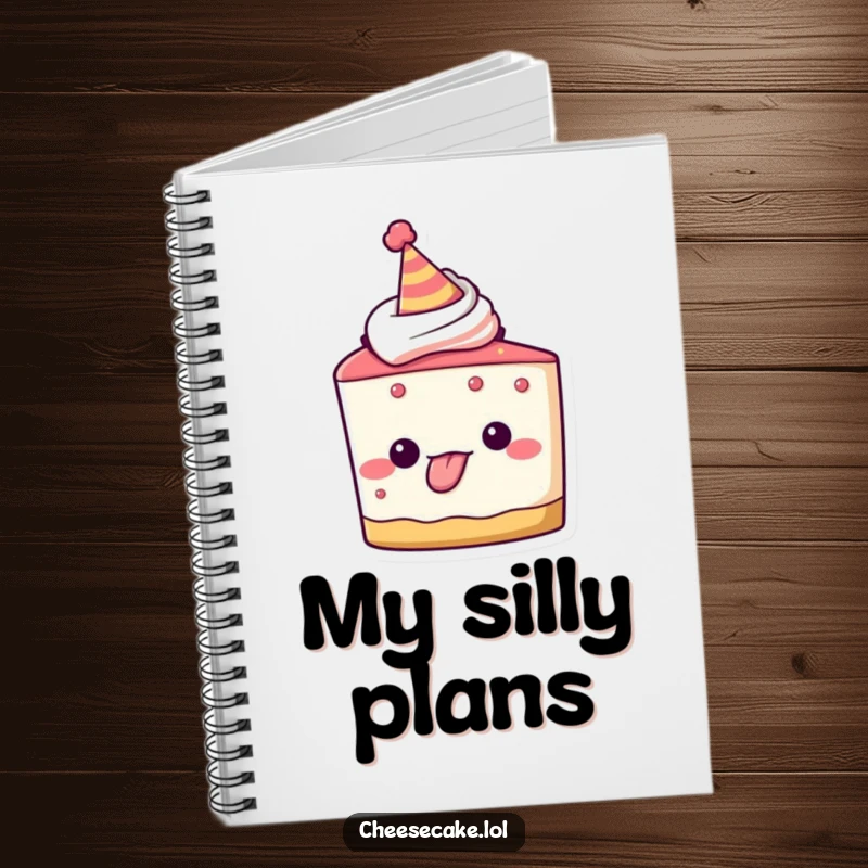 Funny notebook with a cheesecake character in a party hat, sticking its tongue out playfully, perfect for journaling fun ideas and cheeky notes.